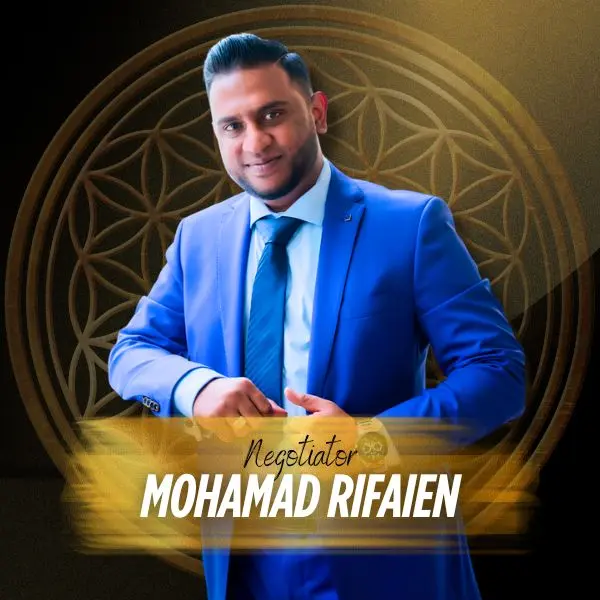 Professional portrait of Mohamad Rifaien, Real Estate Negotiator at IQI Realty wearing a blue suit.