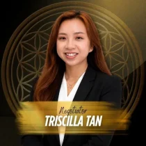 Professional portrait of Triscilla Tan, Real Estate Negotiator at IQI Realty wearing a dark blazer over a white top.